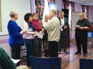 Stan presents each candidate with the Tau cross (2)